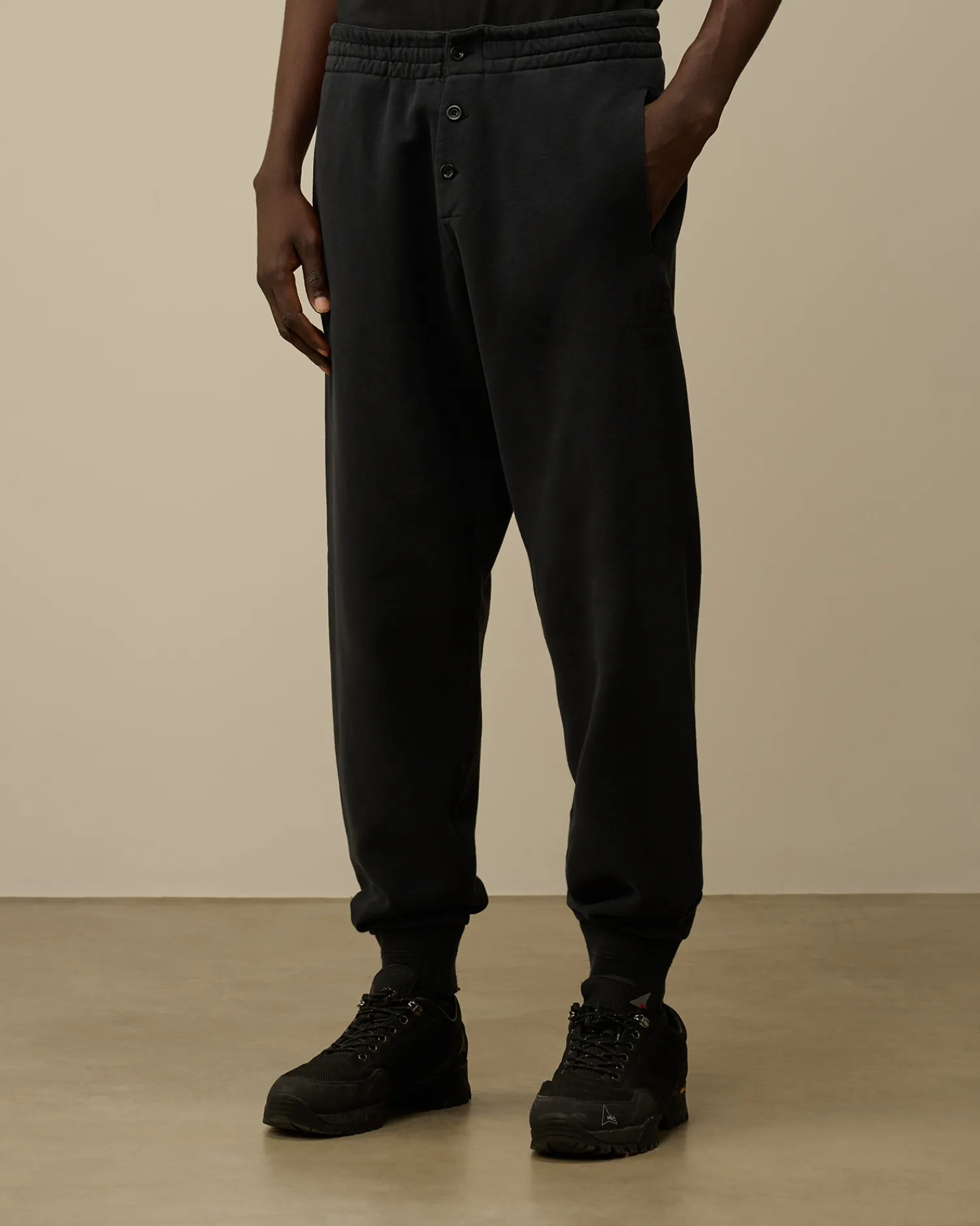 C.P. Company Tute & Shorts>Diagonal Fleece Logo Buttoned Sweatpants Black Sand