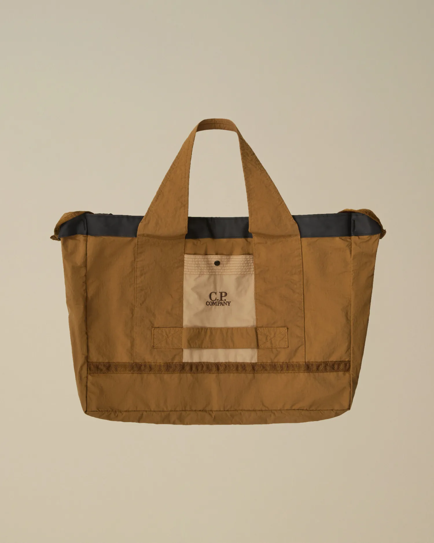 C.P. Company Zaini & Marsupi>Plain Paper Touch Duffel Bag Toffee – Beige